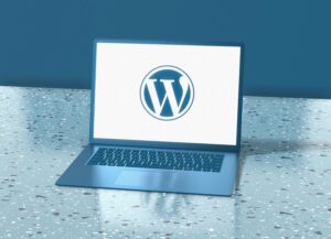 A Laptop showing Wordpress Logo